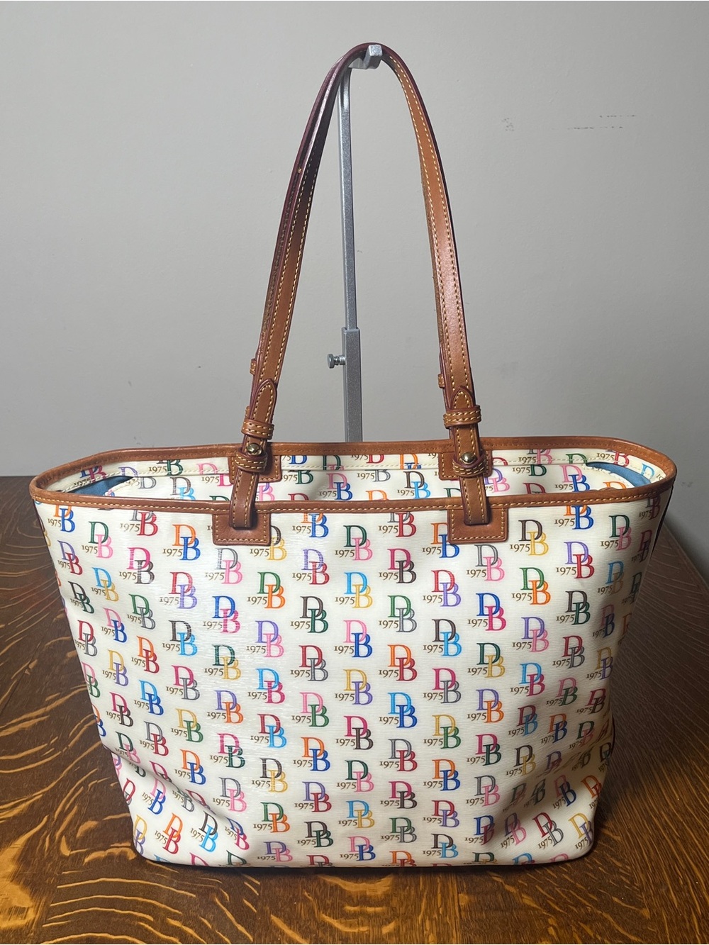 Dooney & Bourke White with Rainbow Monogram Tote with Brown Leather Trim NWOT.